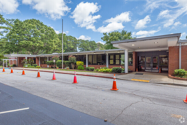 close up shot of the front of the school building showing both entrances