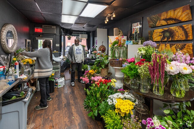 The Flower Bar prepares every bouquet with care for their customers near Evergreen Park.
