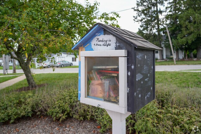 Little lending libraries stocked with books are scattered throughout Colombian Park.