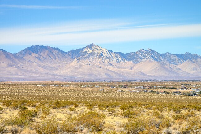 The jagged peaks of the Sierra Nevada Mountains surround Ridgecrest.