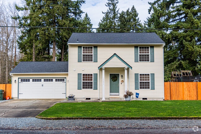 Beautiful four square style home with attached garage in the South Hill Neighborhood.