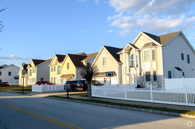 Suburban-style homes in Somerton, PA, use customized fences to distinguish their yards.