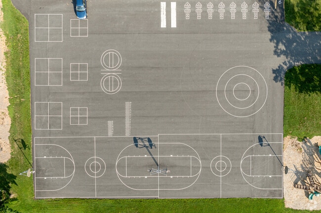 A parking lot doubles as a place space for Clearview Elementary School students.