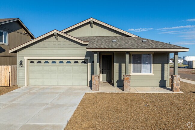 This one story home is well kept in the neighborhood of Flagstaff Meadows.