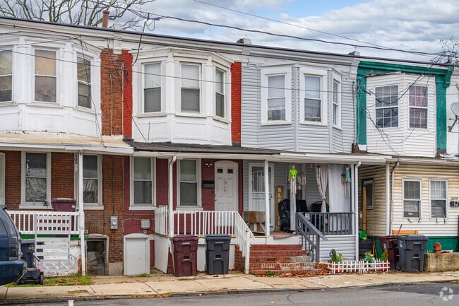 Gothic townhomes in Riverside often have small shaded front porches.