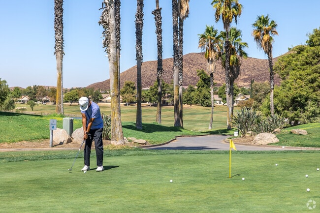 Practice your short game at Menifee Lakes Country Club, near Canyon Cove.