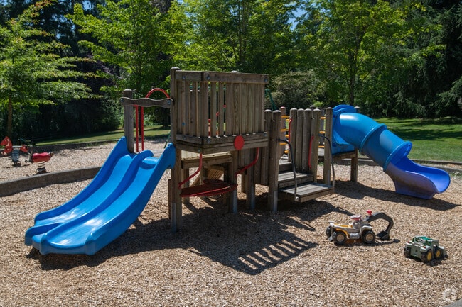Playground with attached slide for kids to play on at April Hill Park, Oregon.