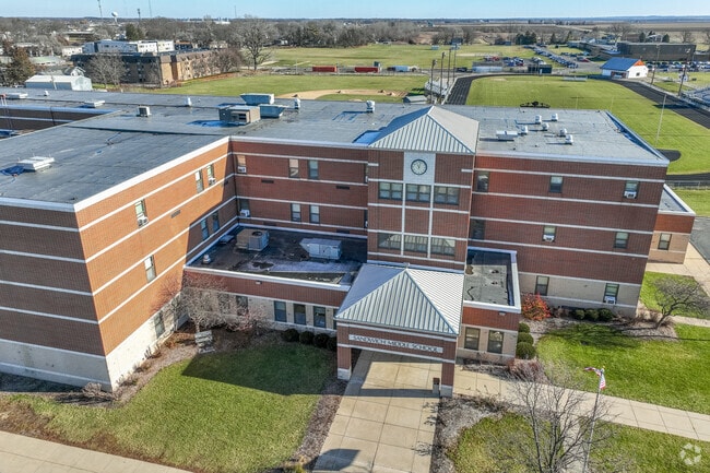 Sandwich Middle School has a covered front entrance with clock detail makes this building unique