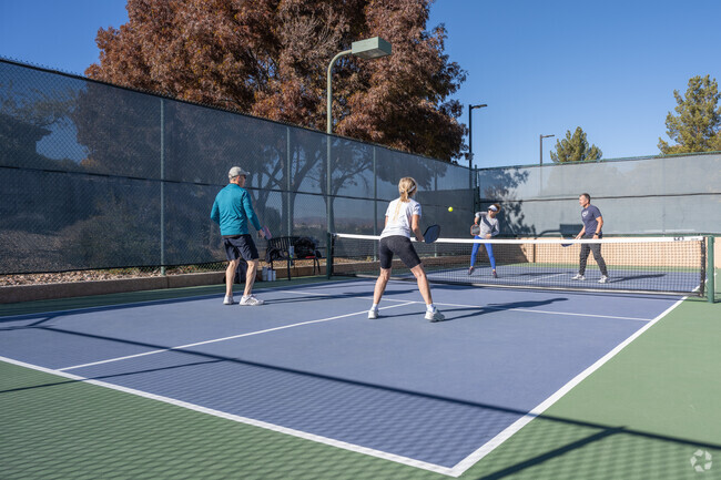 In Stone Cliff, locals enjoy playing pickleball with their friends.