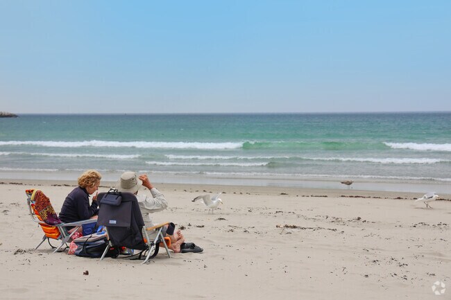 People from all over the North Shore come to relax on Good Harbor Beach in Gloucester.