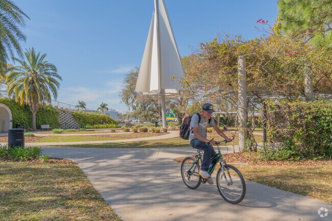 Paved trails run through the Cancer Survivors Plaza in the Stadium Area.