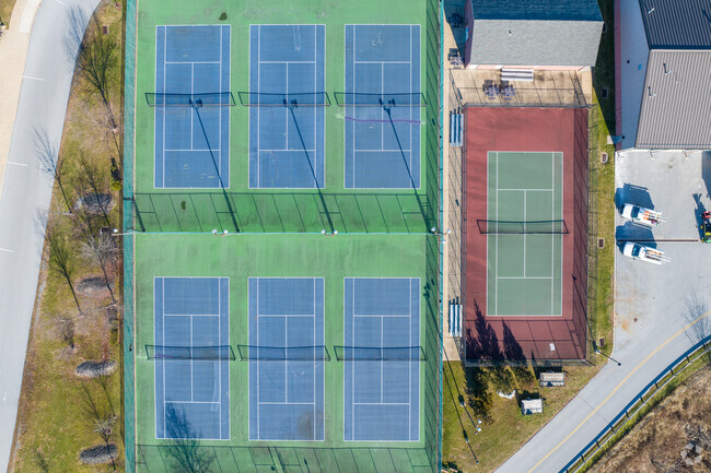 Phoenixville Area High School includes tennis courts on which students compete.