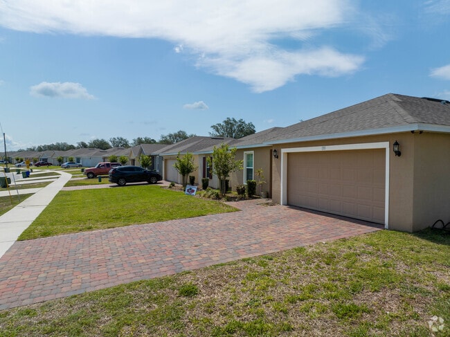 Lush green lawns with traditional home features have become very popular in Lake Lucerne.