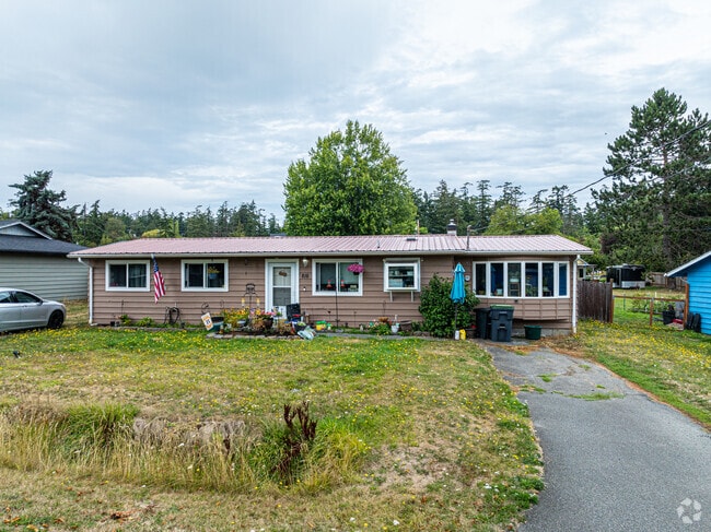 This nice rancher home has some large windows to let in more light.