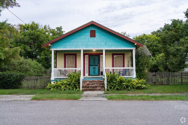 This home is a blend of Cottage and Colonial Revival architectural styles in Holy Cross.