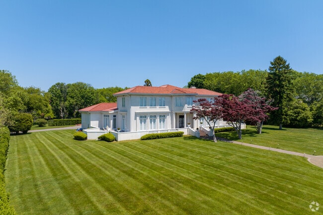 Large estates with perfect lawns are a mainstay in Deal.