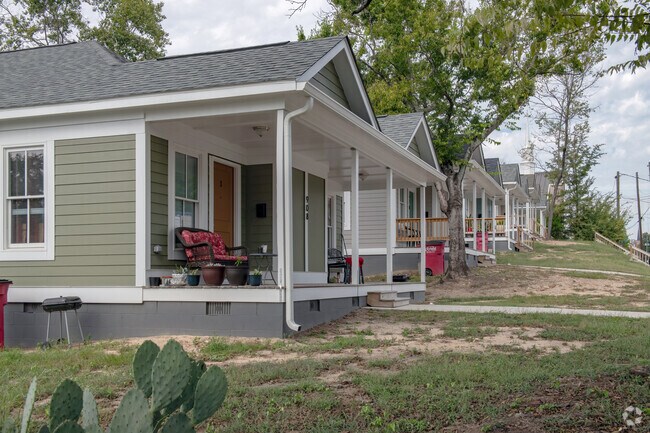 A neat row of new homes is pleasantly poised on the hill of Bealls Hill Historic District.