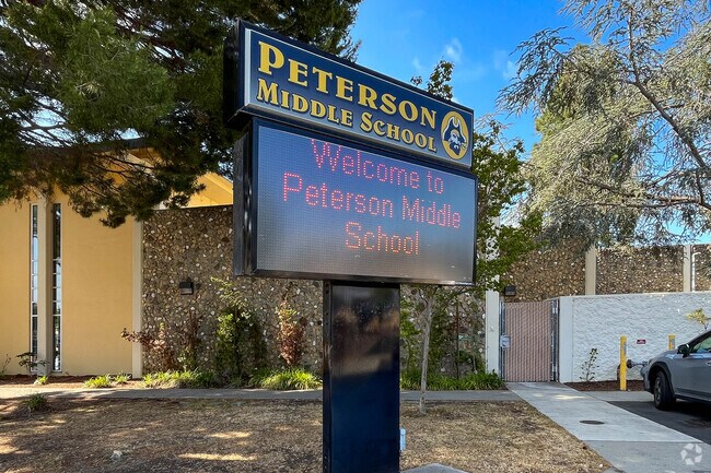 Peterson Middle School welcomes students as they enter.