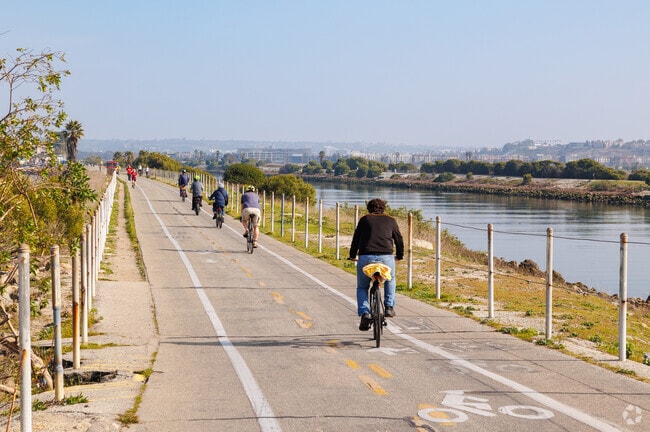 Go for a bike ride down the Ballona Creek Bike Path in Playa Del Rey, CA.