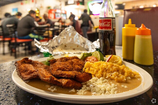 Milanesa De Pollo is a delicious lightly breaded fried chicken at Molcajetes in Western Village
