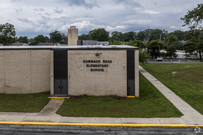 The name of the school is predominant on the front wall.
