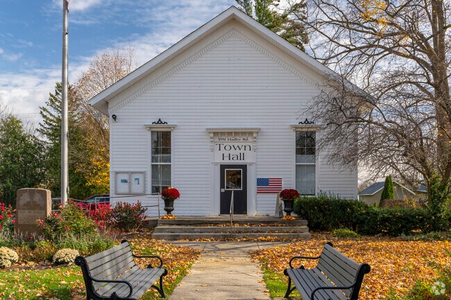 Town Hall is a well-maintained historical building in Hadley Township.