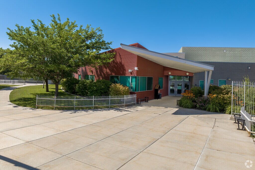 A bright red brick building at Freedom Elementary School.