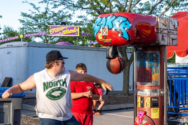 Test your might on the carnival games at the Heritage and Freedom Fest.