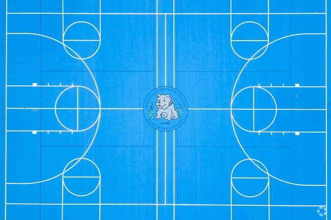 Sports fields and gymnasium are used for physical education and team sports.