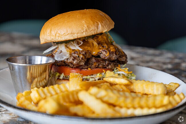 The Backyard has served smoked meats and craft bourbon in West End since 2014.