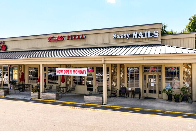 Ballentine Market offers a grocery store, pizza restaurant, and nail salon.