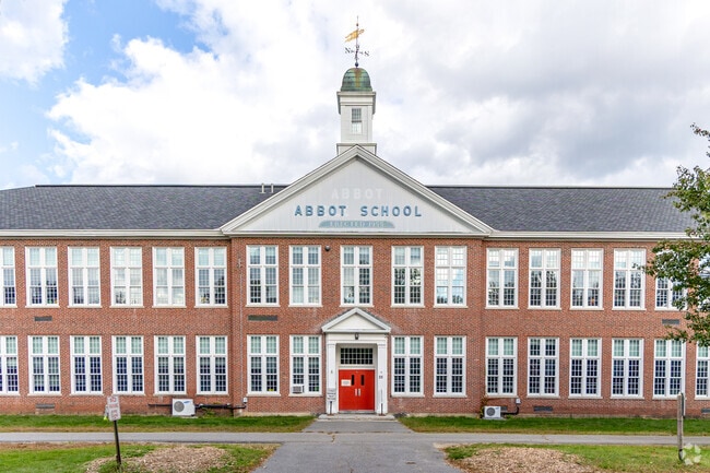 Abbot Elementary School's front entrance features a grand compass.