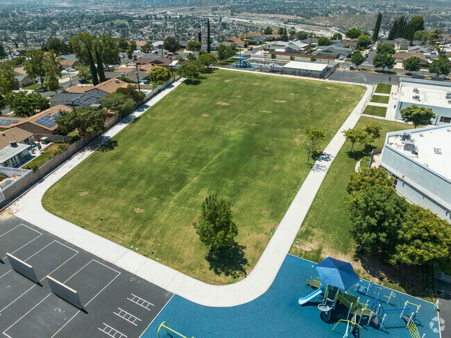 A large field at Skyblue Mesa Elementary School in Canyon Country hosts a variety of games.