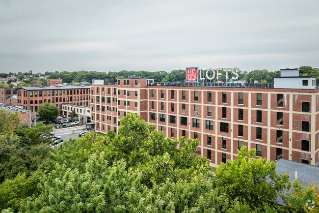 Admire the unique architecture of mill buildings now serving as stylish lofts in Valley, RI.