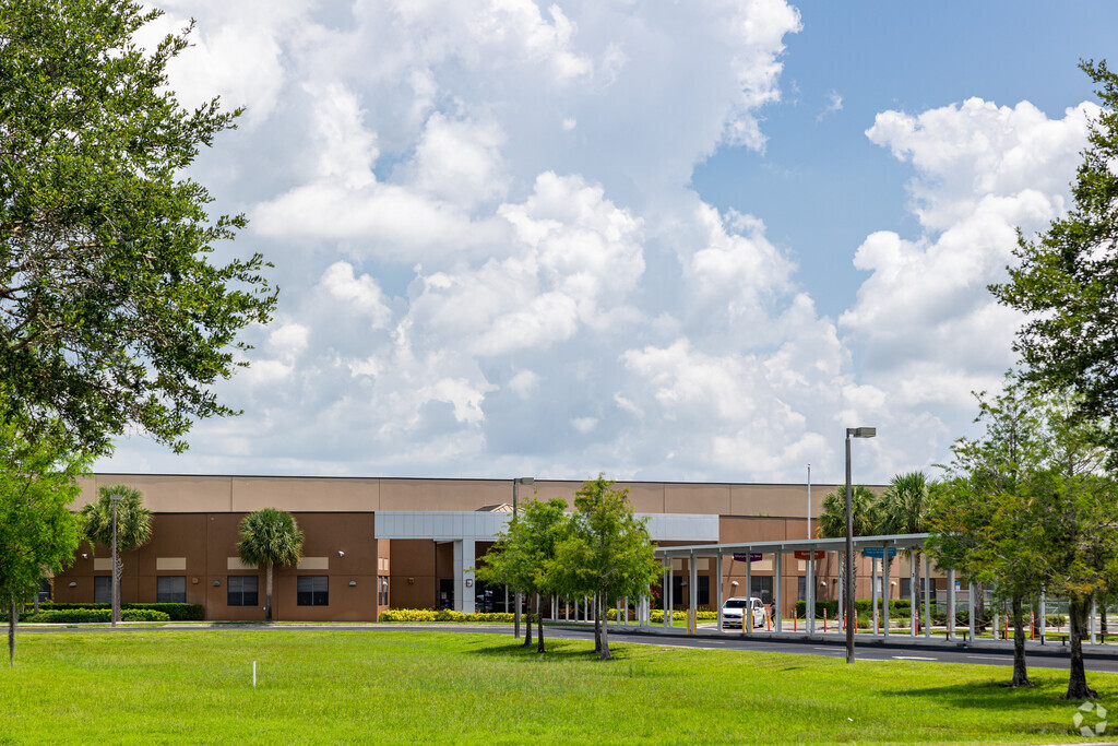 Eden Park Elementary in Immokalee features a covered walkway leading to the main entrance.