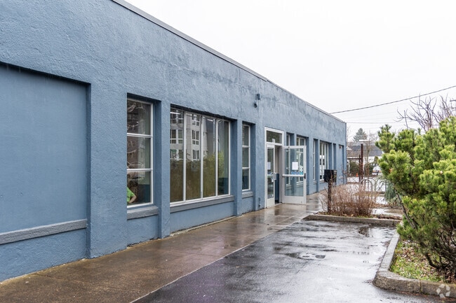 Students dive into naturalist studies at Portland Forest School.