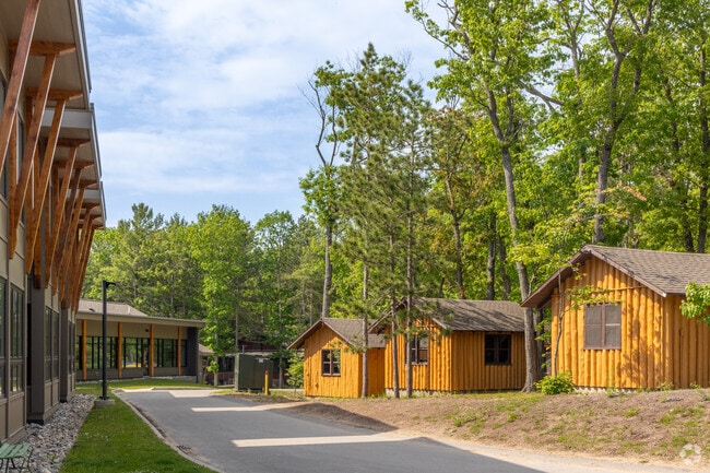 Dow House faces the practice cabins at Interlochen Center for the Arts.