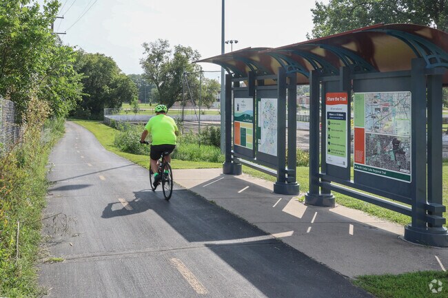 The Cedar Lake Trail passes through Nelson Park and often carries cyclists and walkers.