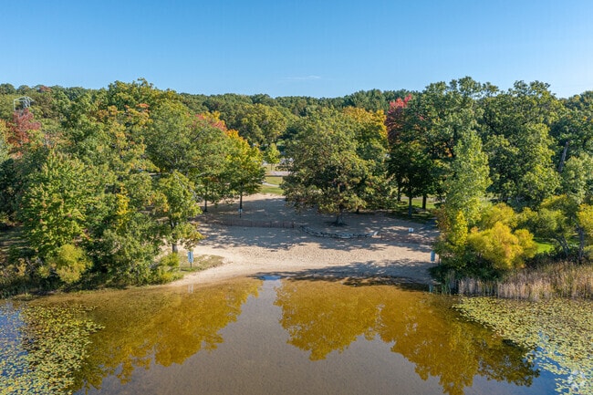 There is a small beach at the northeast corner of the lake at Long Lake Park where you can swim.