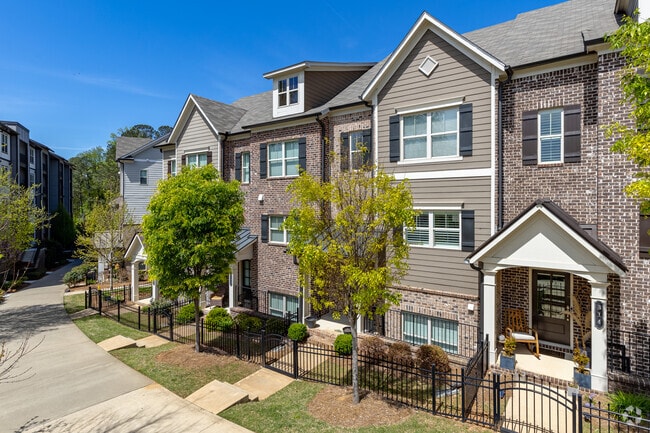 Townhomes in Woodstock are built on the edge of Greenprints Trail.