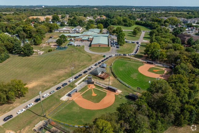 Spring Hill Elementary School have the little league adjacent to it's campus.