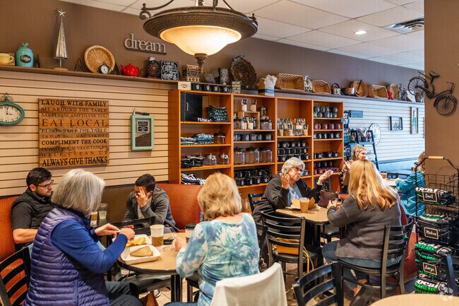 Patrons enjoy coffee and conversation at a Third Lake staple.