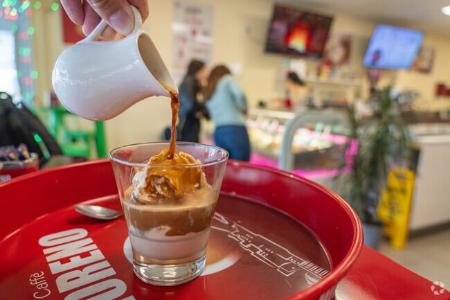 Unwind at the charming Gelateria, immersed in the sea breeze atmosphere.