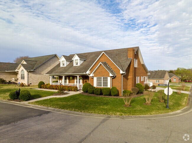 Here is Hopewell is a split-level brick home in Cobblestone an over 55 community.