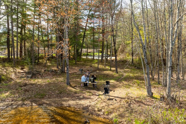 Locals prepare their fishing rods to catch fish on Tully Lake in Royalston.