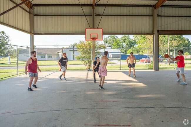 Residents of Maplewood shoot hoops every evening at the Center Circle Park courts.