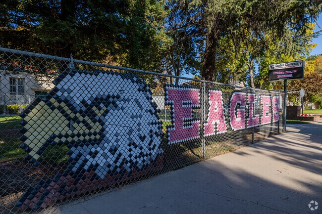 Enslen Elementary mascot is a bald eagle, emblazoned on the fence in Aurora, CA.