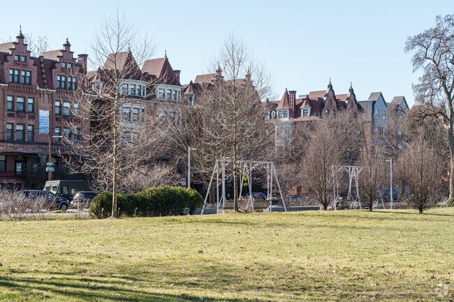 The swinging benches at Centennial Commons are a fun way to relax in West Parkside.
