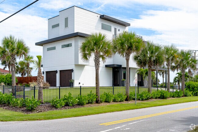 Modern homes in Wilbur By The Sea blend sleek coastal architecture with open layouts and panoramic ocean views.