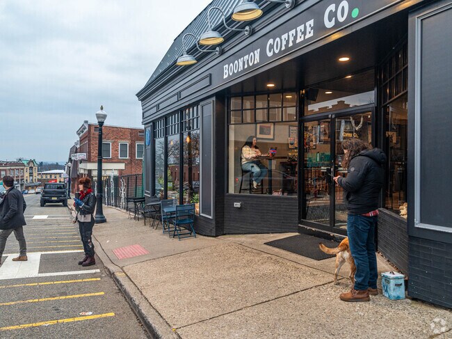 Residents walk the streets of Main Street in Boonton exploring the variety of shops.